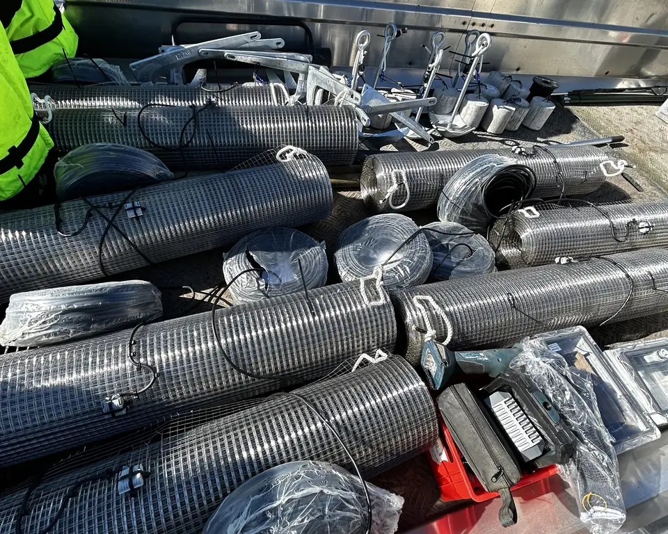 Redoxa grid rolls and field equipment on a deployment boat